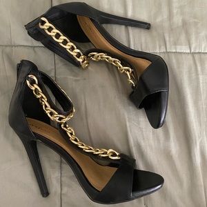 Gold chain black high heels
